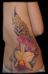 lower back flower tattoo